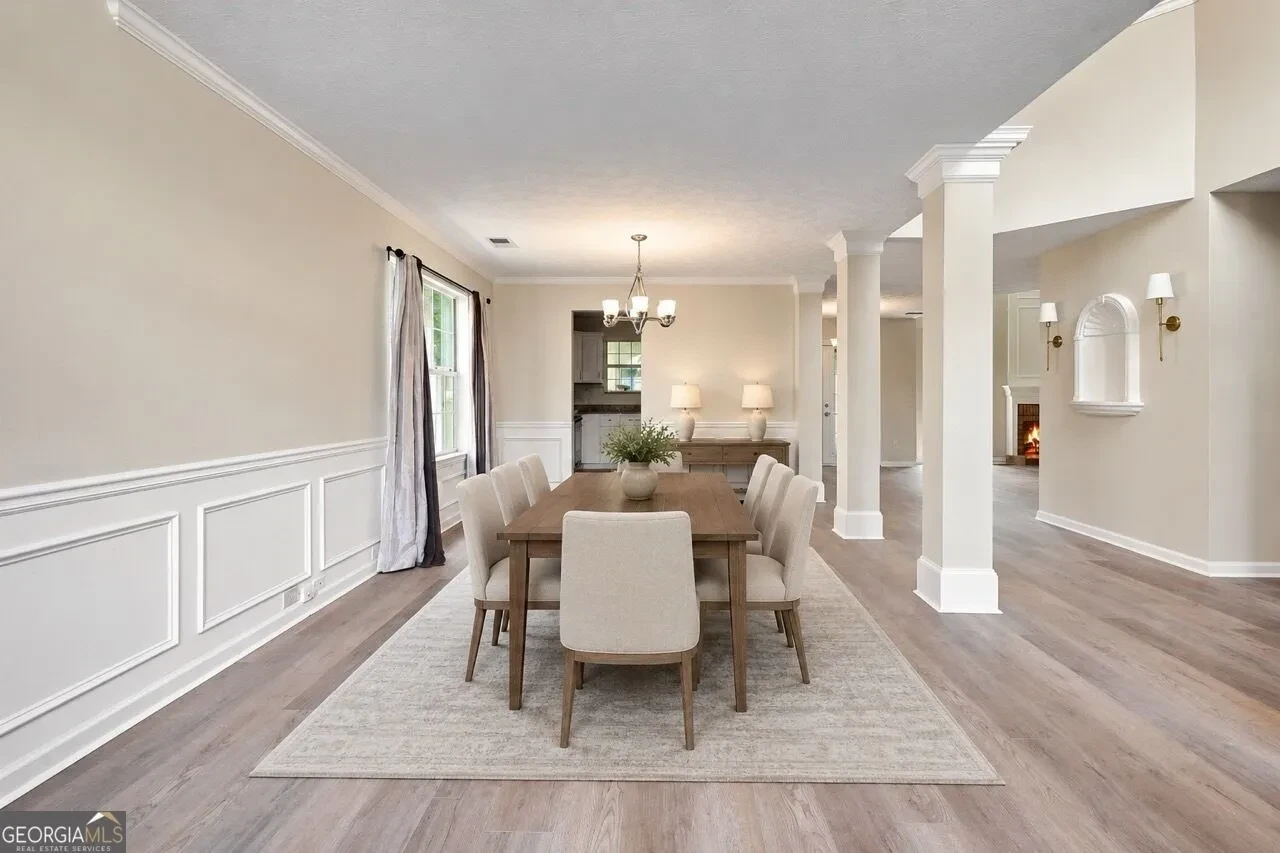 Formal dining room with wainscoting